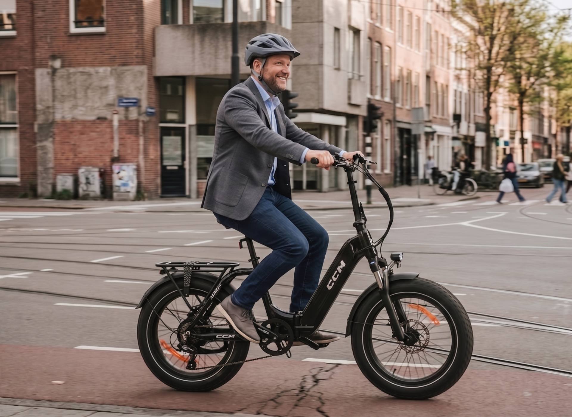 Man riding a CCM Portage folding ebike commuter step through